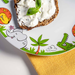 Kindergeschirr BAMBINI mit Krokodil, Elefant und Löwe, Teller mit Toast und Frischkäse