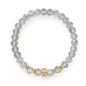 Armband BERNA gold mit facettierten Perlen und goldenen Zwischenelementen auf weißem Hintergrund