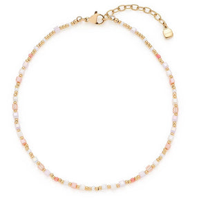 Fußkette SHARI gold CIAO mit Perlen in Weiß, Rosa und Gold auf weißem Hintergrund