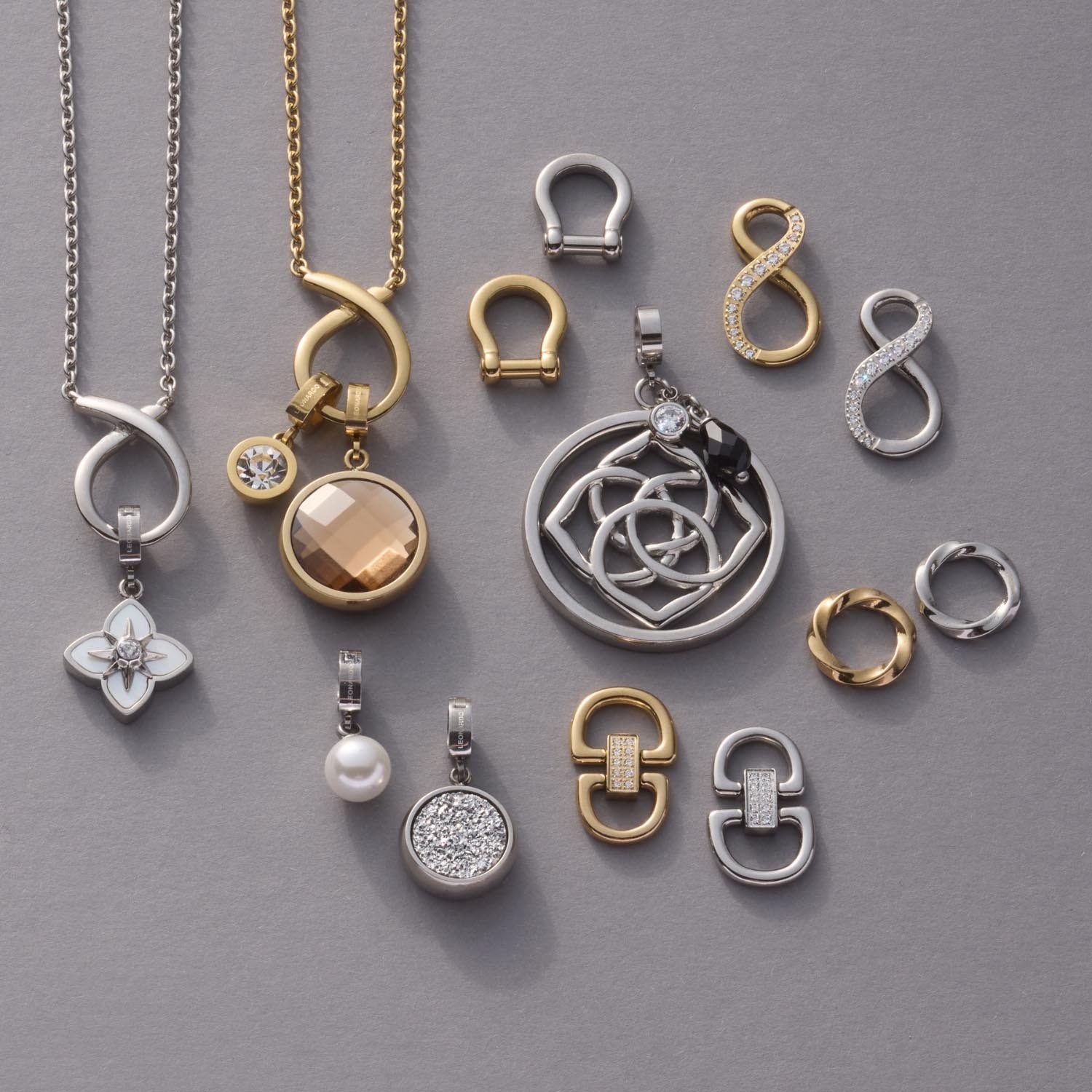 Schäkel TUXIDO gold Clip & Mix mit Kettenanhängern und Verschlusselementen in Gold und Silber