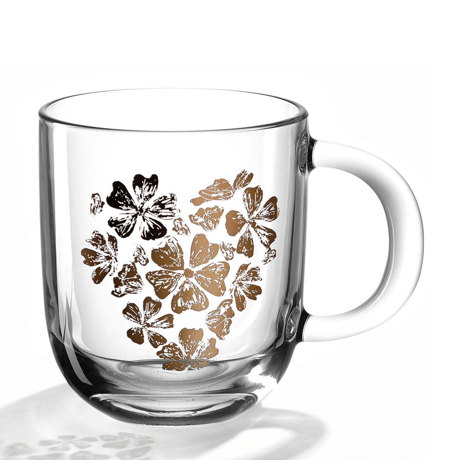 Tasse EMOZIONE mit goldenem Blumenherz-Motiv auf weißem Untergrund