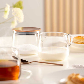 Zuckerdose TÈ PER TE mit Milchkanne auf gedecktem Frühstückstisch